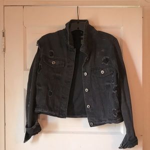 Black jean jacket with ripped detailing